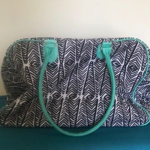 Weekend bag with two clear makeup bags.